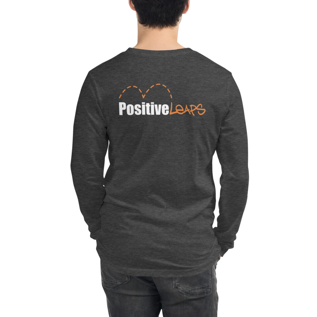 "Strong Minds Start Here" Unisex Long Sleeve Tee (Positive Leaps logo on back) 10 Back view of a person modeling a charcoal heather long-sleeved shirt with the "Positive Leaps" logo and its heart-shaped leap graphic.