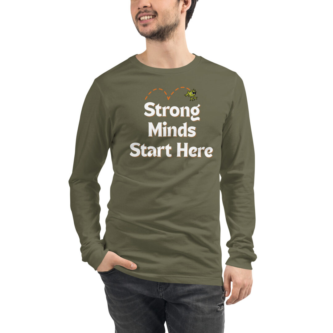 "Strong Minds Start Here" Unisex Long Sleeve Tee (Positive Leaps logo on back) 17 A person models an olive green long-sleeved shirt with the uplifting message, "Strong Minds Start Here."